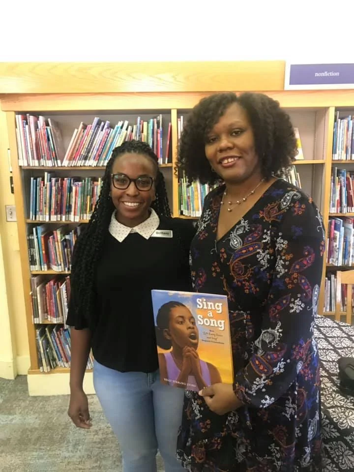 With author Kelly Starling Lyons