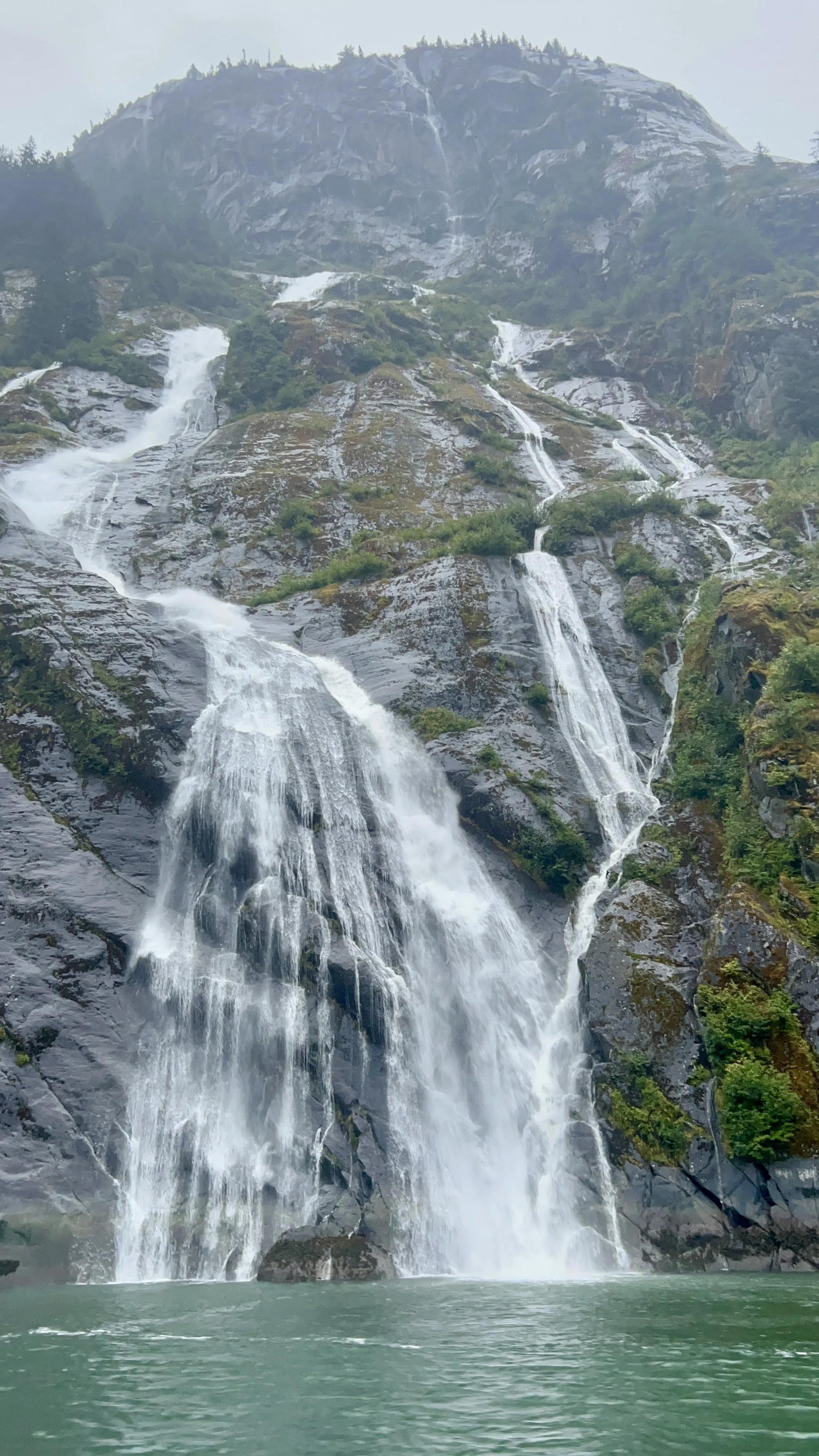 Cascade from mountain down to sea