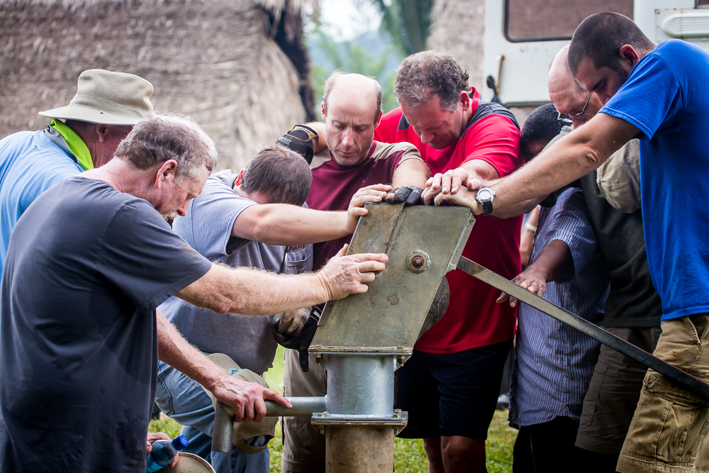 Belize Nov 2014 Praying for those who will use the well.jpg