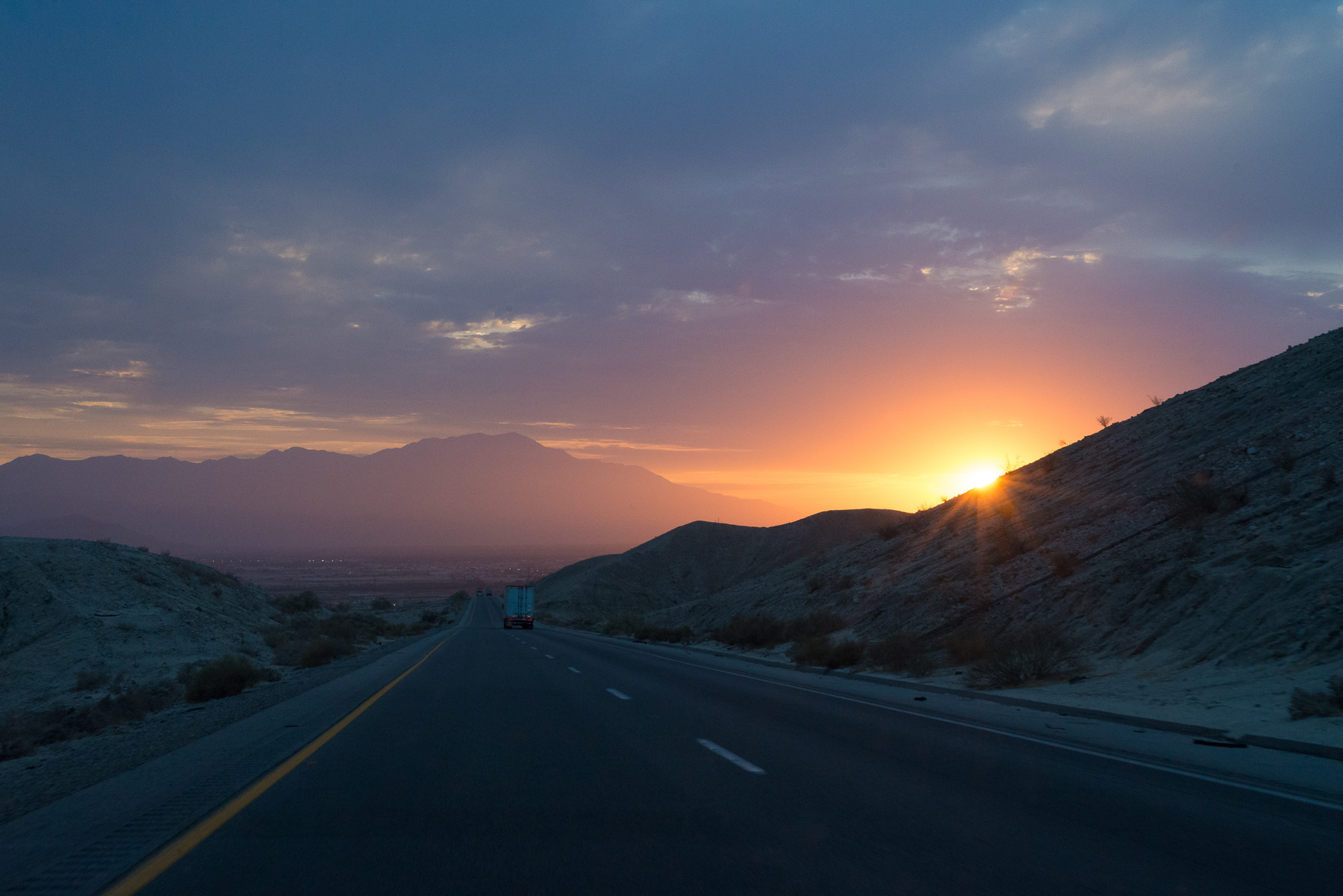 Sunset on the highway outside of Palm Desert, CA