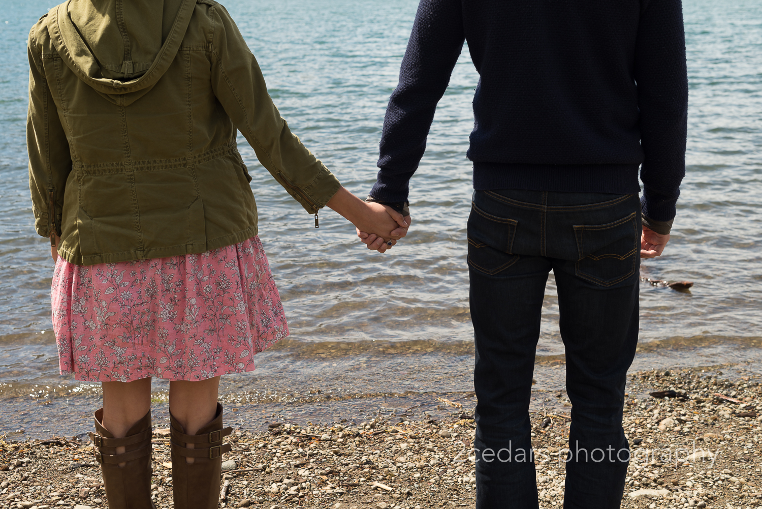 Couple Holding Hands at the Lake