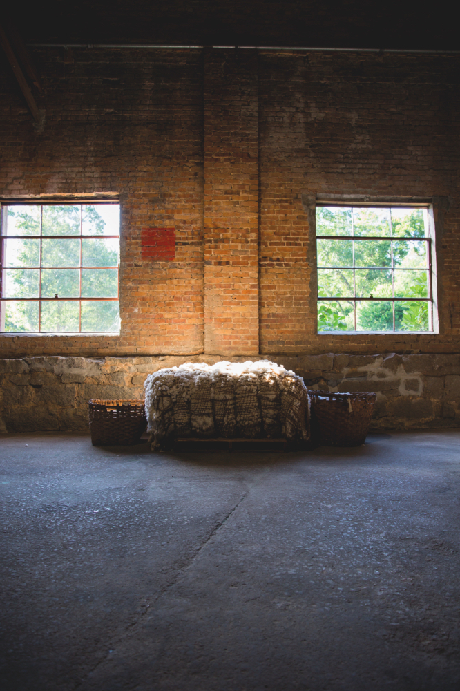 ABOVE: A bale of cotton sits in the warehouse as a nod to Hancock County’s agricultural past.