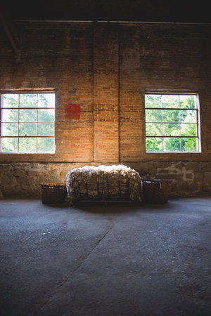 ABOVE: A bale of cotton sits in the warehouse as a nod to Hancock County’s agricultural past.