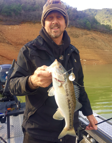 Mike Gadberry of Redding Ca. with a nice Shasta Lake Spotted bass caught while fishing with Jeff Goodwin.