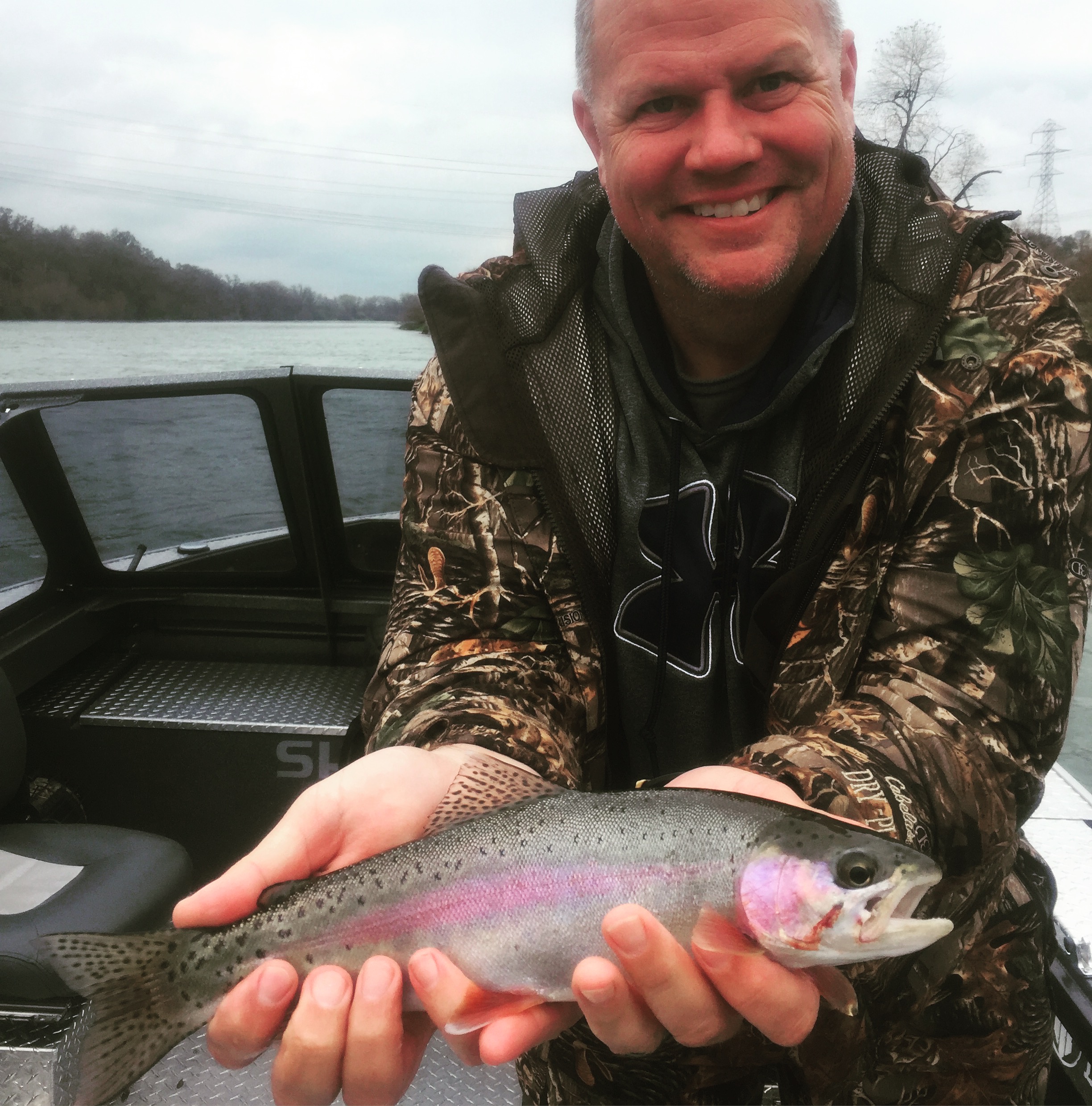 Chris Dugger of Redding, Ca. with a nice Sacramento River rainbow.