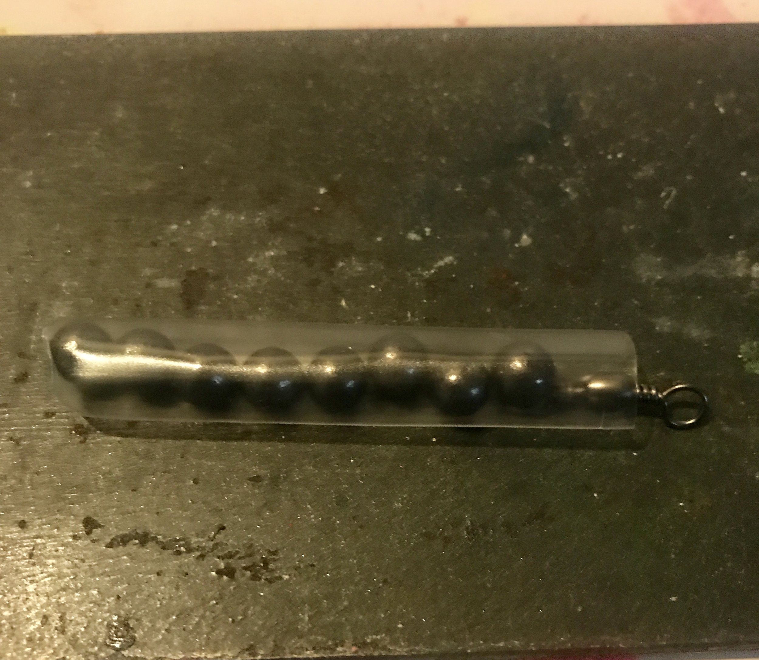 Heat one end of the heat shrink tube before you load your lead shot!