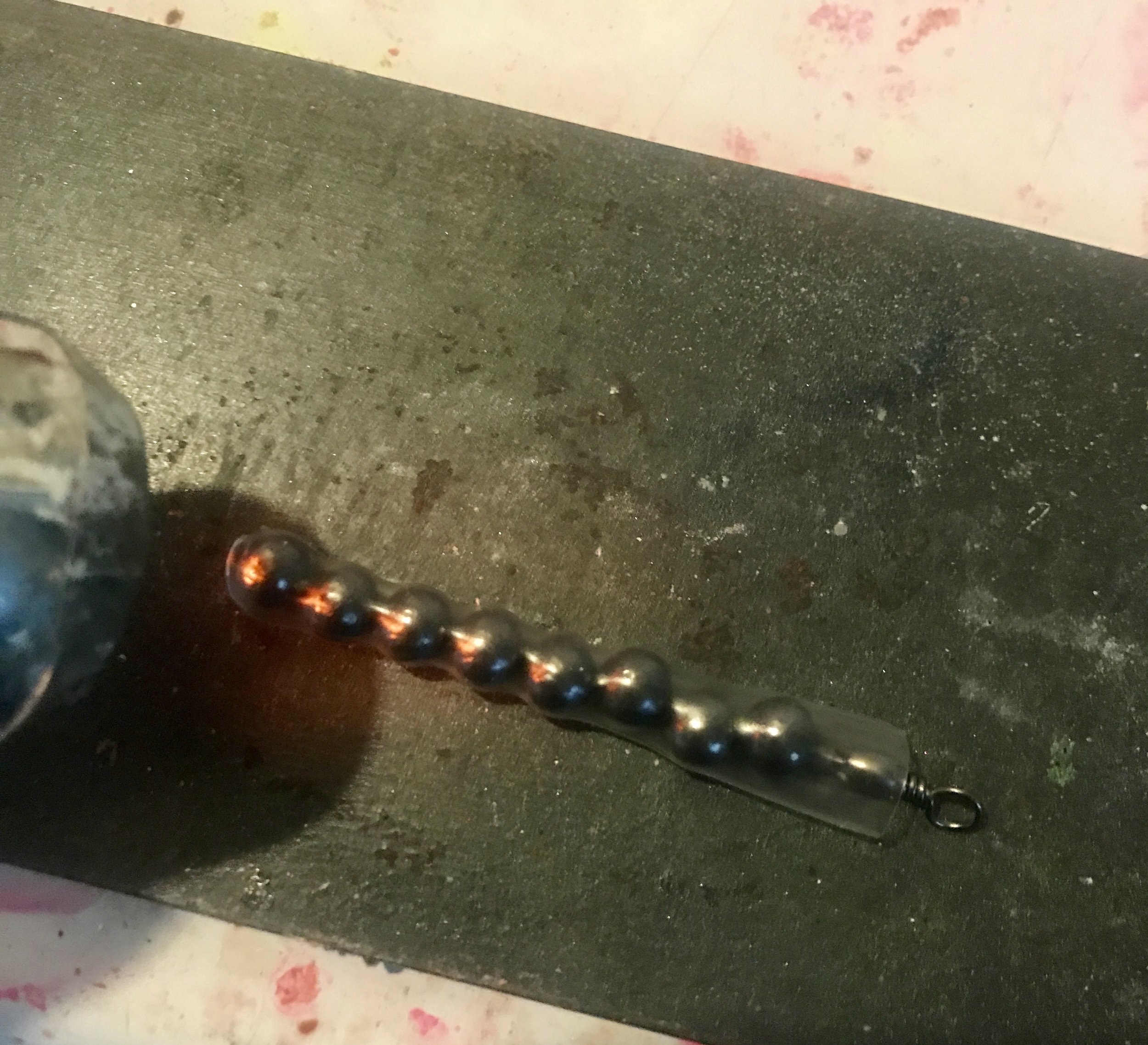 Use a heat gun to shrink the heat shrink tubing around your lead shot and swivel.