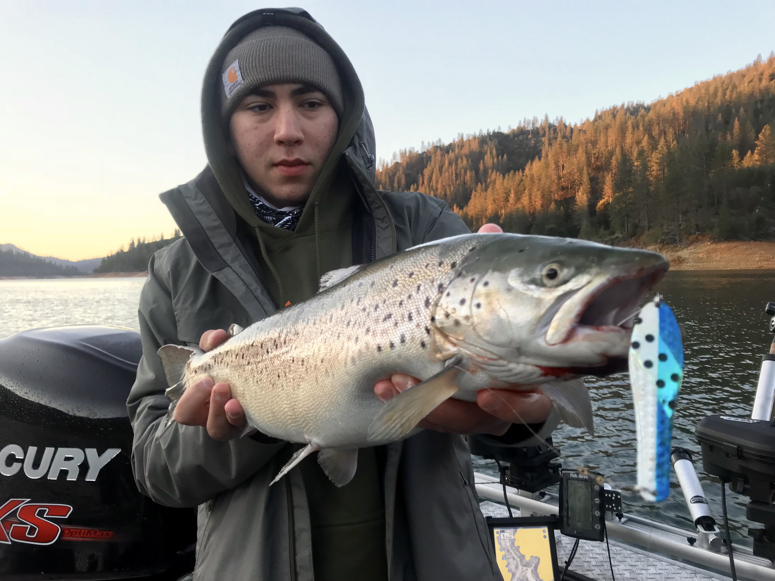 Tovin Schwartz of San Diego with a big German brown caught with an Optimizer spoon.