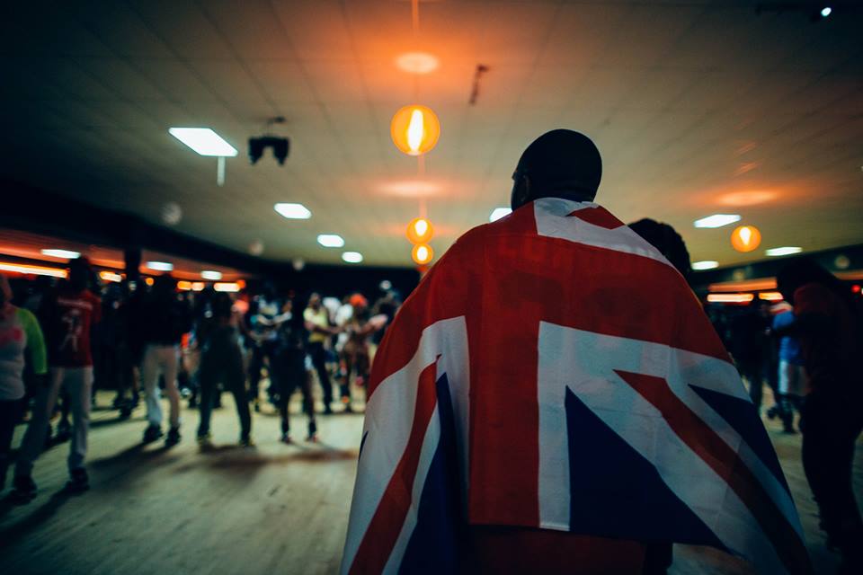 Ash, a skater from London, takes in the scenery at Cascade Roller Rink. Atlanta, Georgia. 
