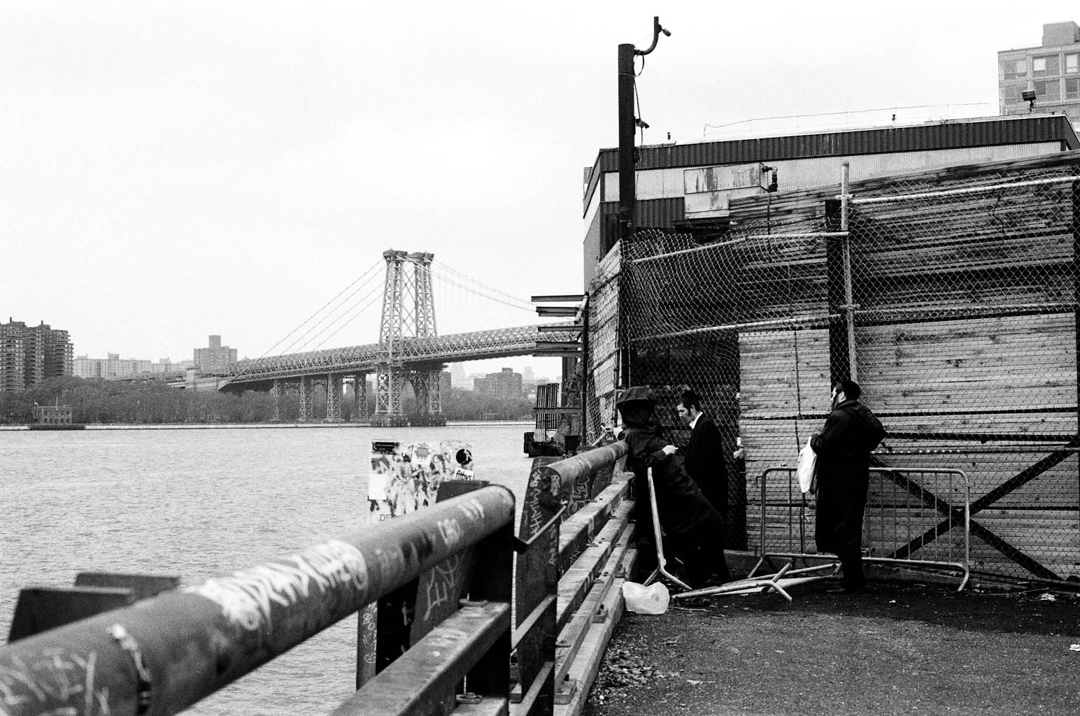   Hasidic youth take a smoke break near Kent Avenue in Williamsburg the day after Hurricane Sandy.&nbsp;  