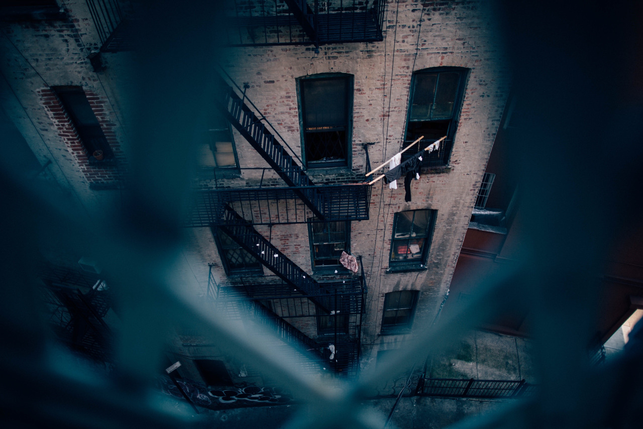   Tenement-style apartments as seen from the Manhattan Bridge. Two Bridges, New York.&nbsp;  