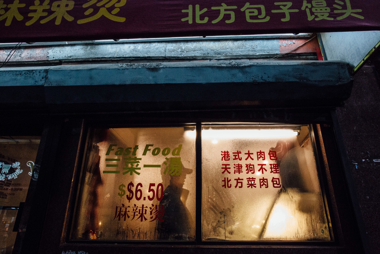   A patron orders at a shop in Chinatown. Boston, Massachusetts.&nbsp;  
