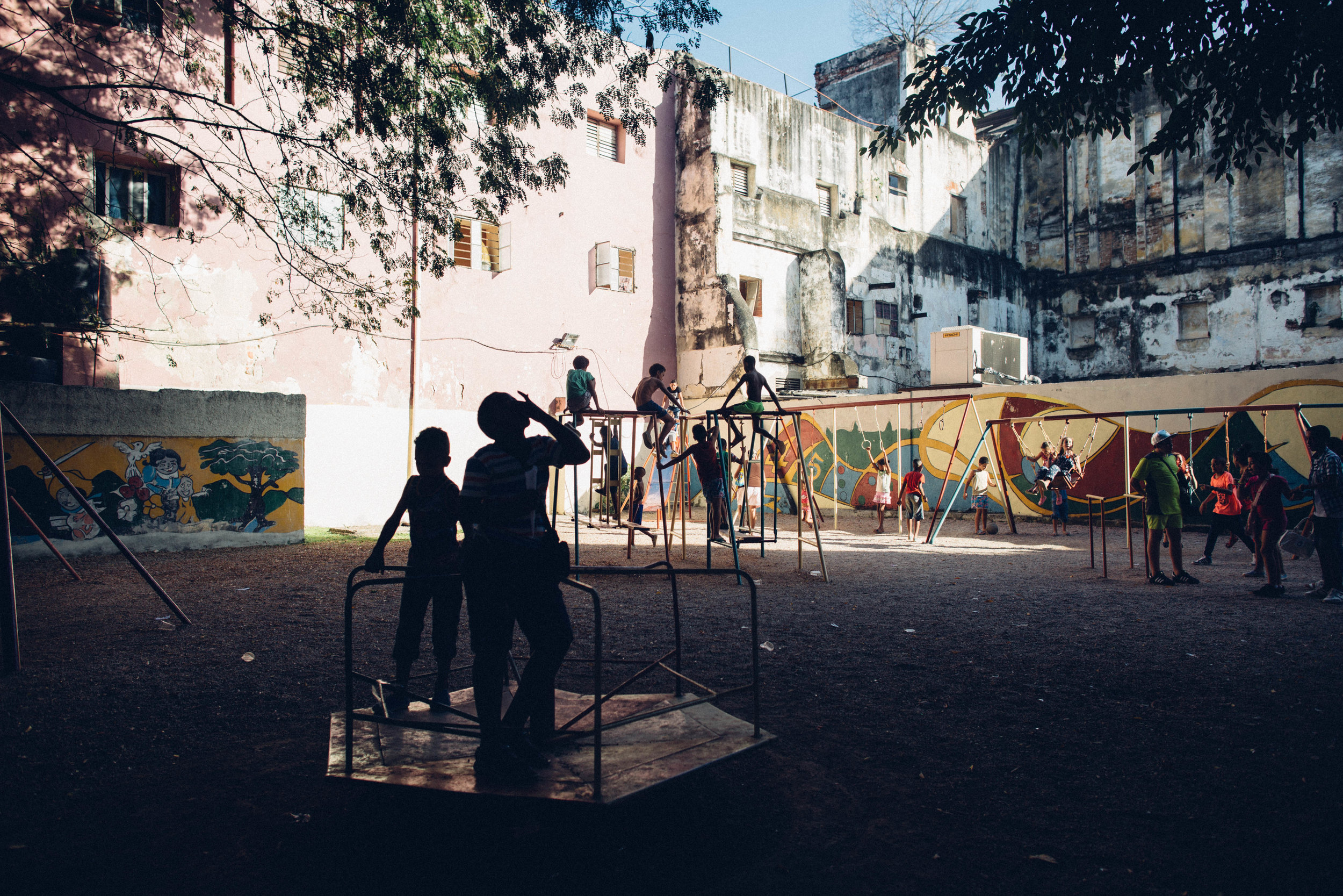   Kids play at playground on Calle San Rafael. Havana, Cuba.  