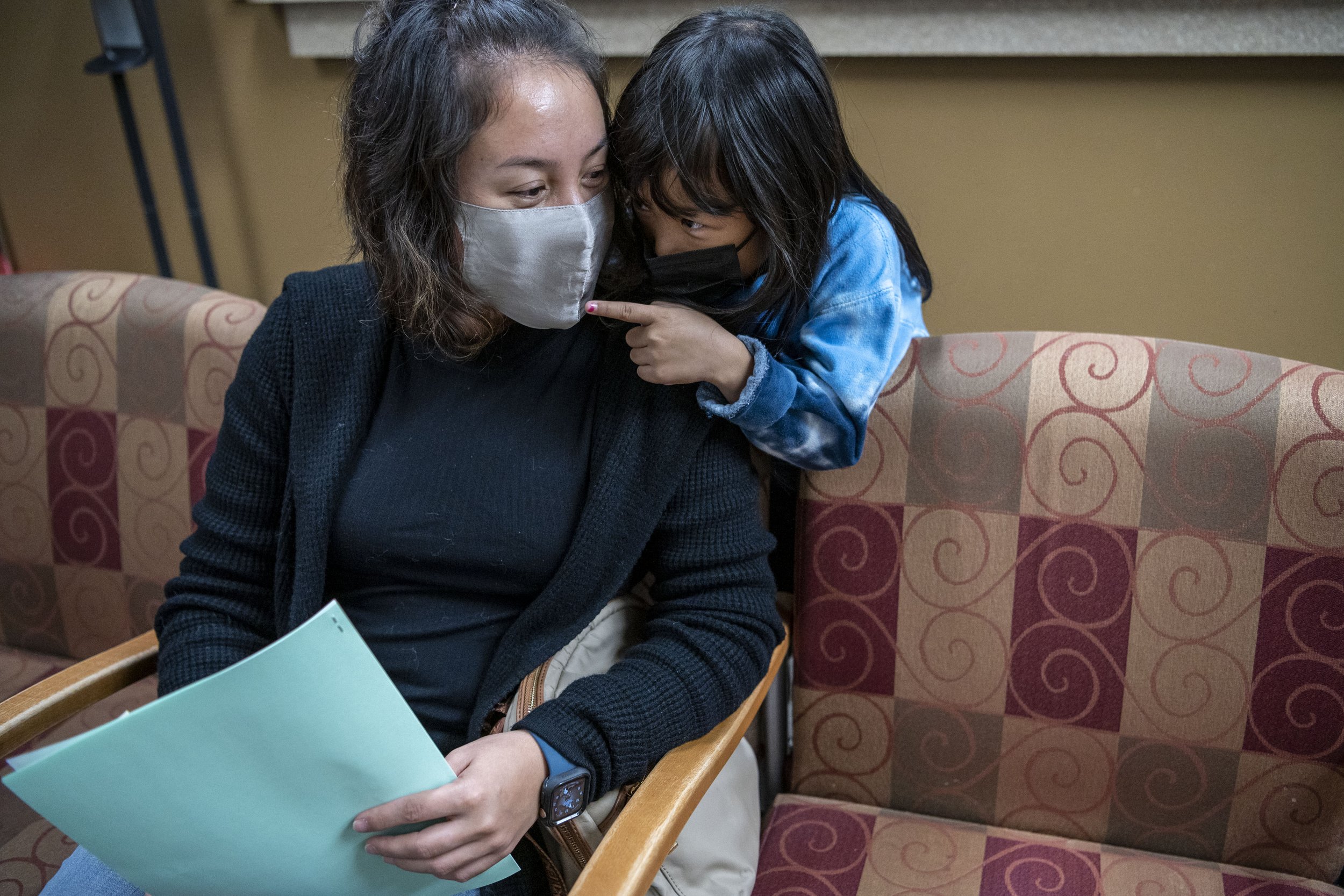  Tu Par waits the required 15 minutes after her daughter Abigail Par, 6, receives Pfizer’s COVID-19 vaccine at the Toeller building in Battle Creek, Michigan on Monday, Nov. 8. Children ages 5-11 are now eligible to receive Pfizer’s COVID-19 vaccine.