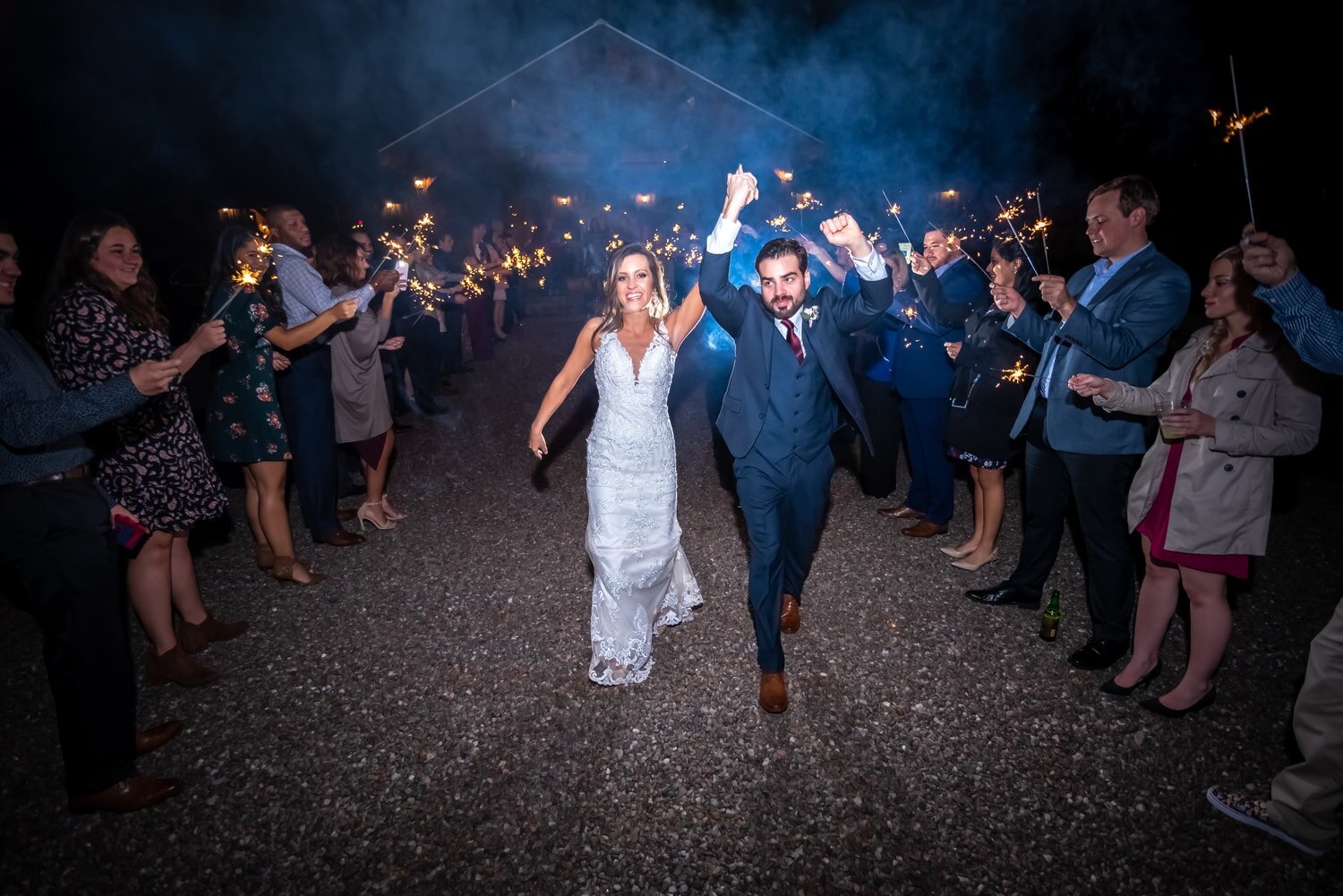 bride-groom-happy-wedding-exit-sparklers-night-dark-thesprings-chadandbriephotography.jpg