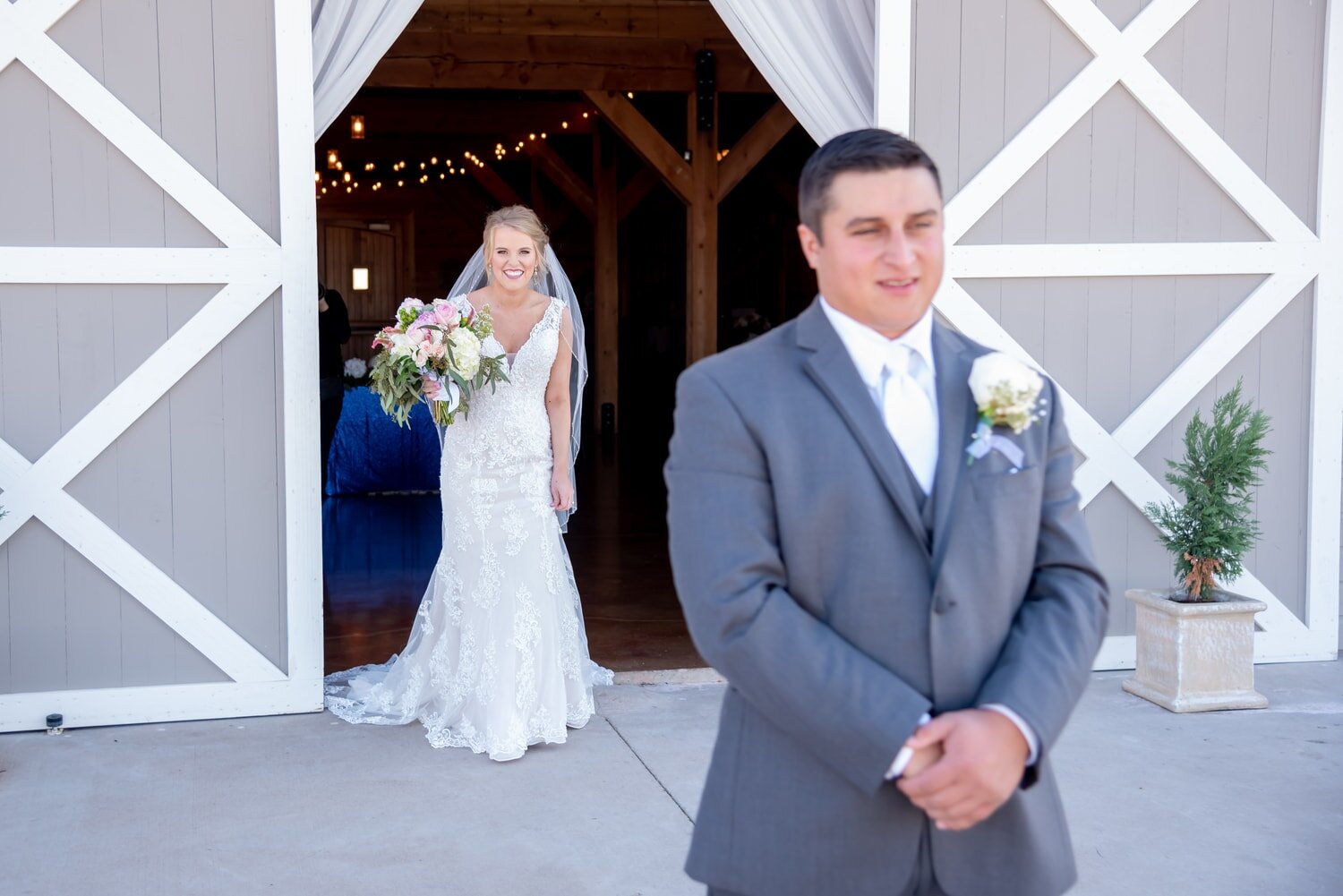 wedding-photographer-photography-okc-edmond-oklahoma-city-beautiful-bride-groom-first-look-portrait-barn-chadandbriephotography.jpg