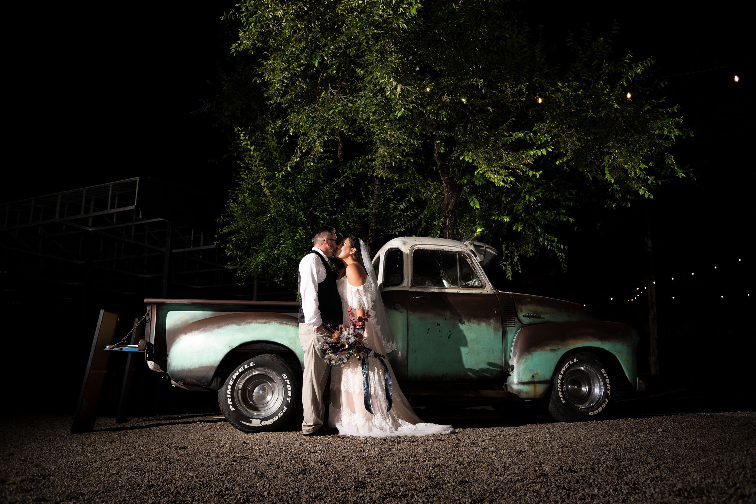 wedding-photographer-photography-okc-edmond-oklahoma-city-beautiful-bride-groom-night-portrait-truck-gin-venue-chadandbriephotography.jpg