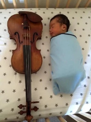 My 5-day-old son next to a 300-year-old Stradivarius...No, he couldn't roll over yet