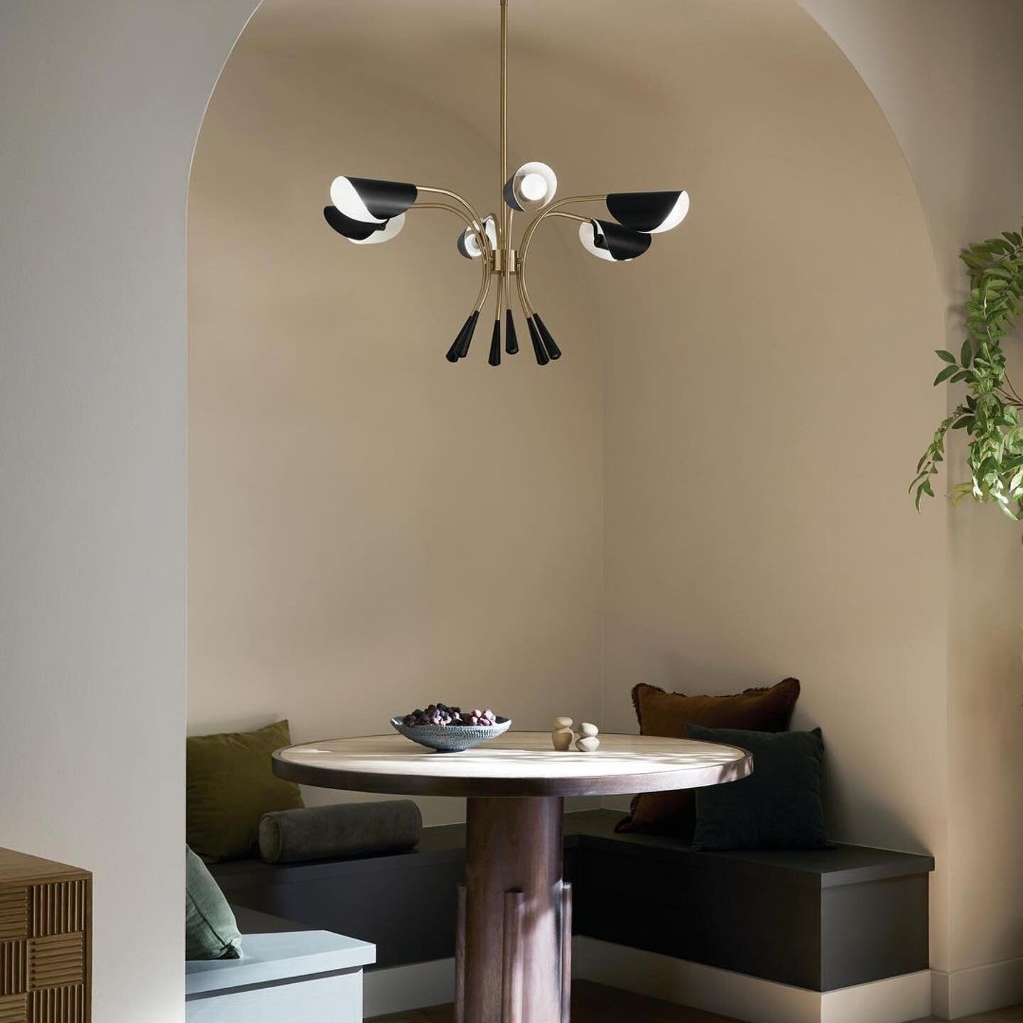 With unique shades inspired by softly cupped leaves and petals, the Arcus chandelier is as stylish as it is functional. 

Rotate the shades to direct the light as you wish. It works well in large open spaces, and its dual-finish in satin nickel and b