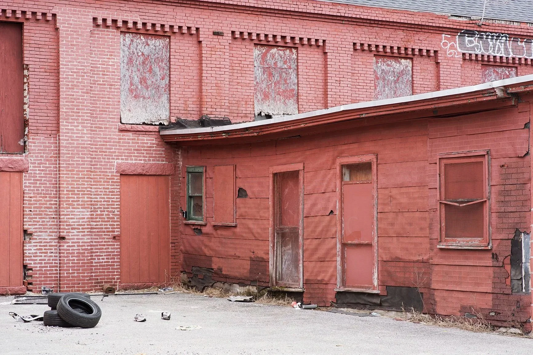   Kevin LeDuc   Lewiston Machine Works, c.  1873, Lewiston, Androscoggin County, Maine, From  Echoes, Still  (2024–2027) —   Grain, Leather, Pulp Portfolio,  Pigment print, 30 × 45 inches, price $0.00  