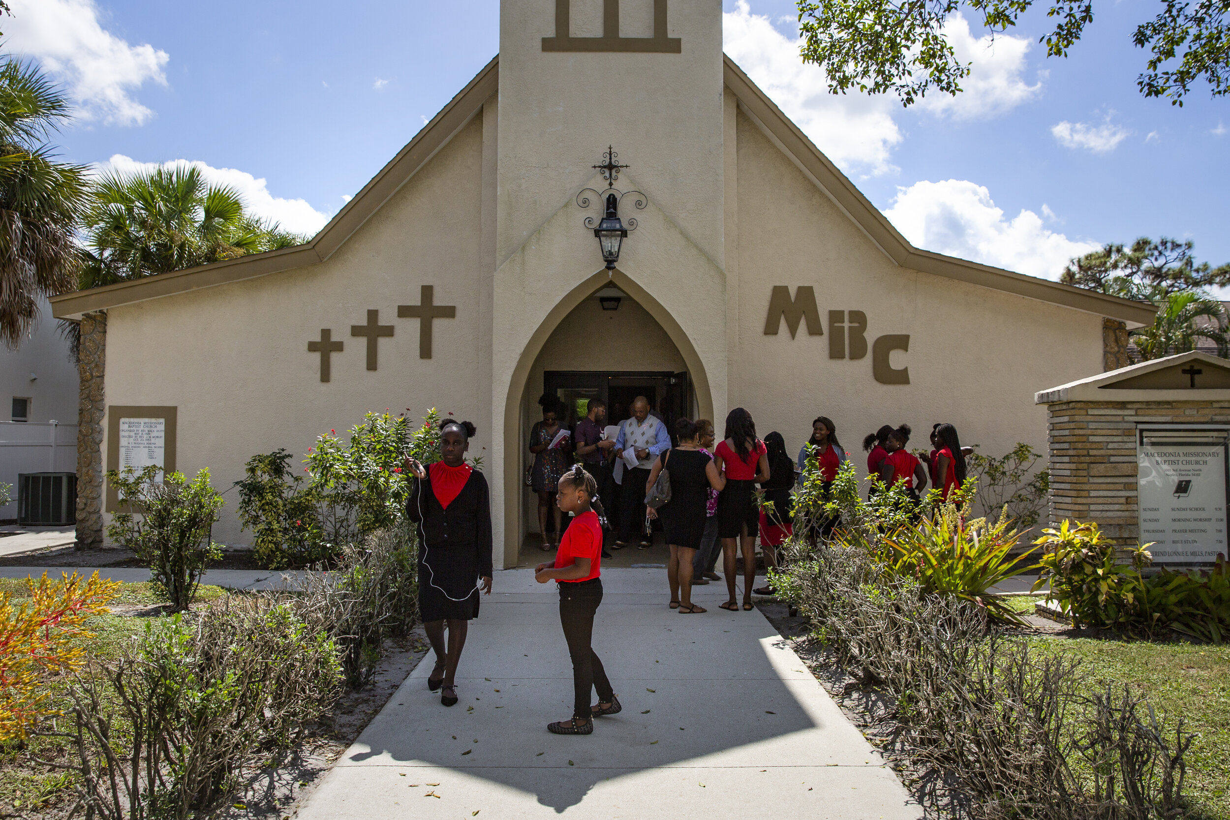  Macedonia Baptist Church members gather outside after church service, Sunday, Oct, 15, 2019, in River Park. 