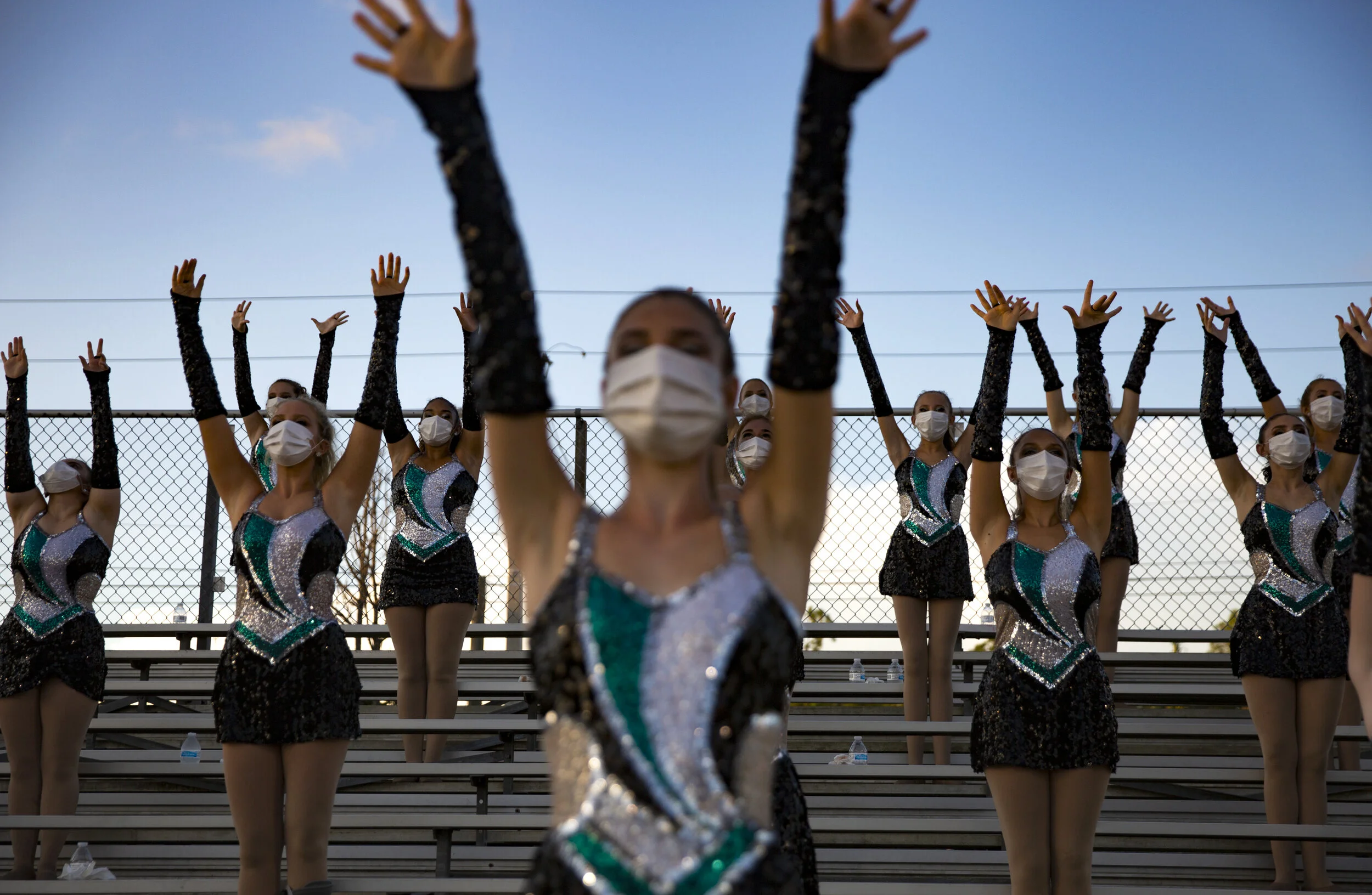  Members of the Gulf Coast High School dance team entertain the crowd before their team takes on the Naples High School on Friday, September 25, 2020, at Gulf Coast High School in North Naples. 