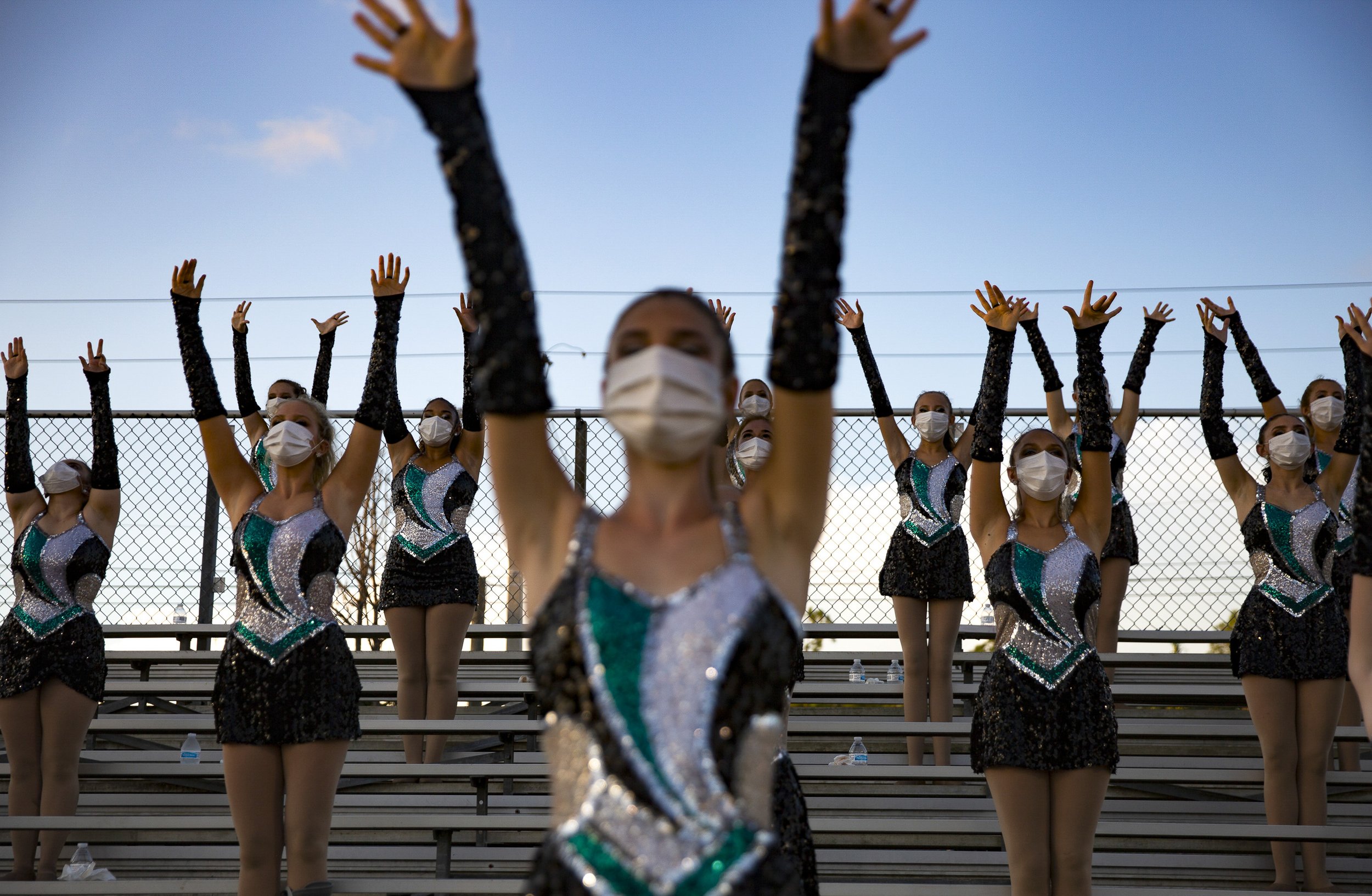 Gulf Coast High School dance team entertain the crowd before ta football game against Naples High School at Gulf Coast High School on Friday, Sept. 25, 2020.