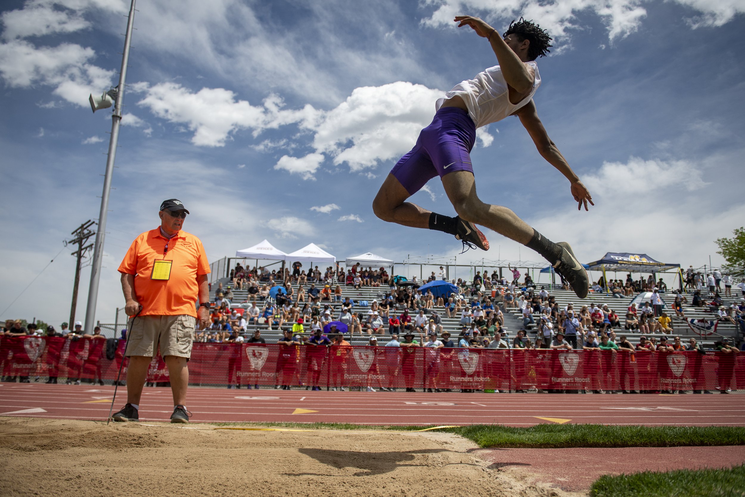 Fort Collins High School's Dontay Johnson jumps 22-feet 10.5-inches in the 5A boys long jump in the Colorado state track championships at Jeffco Stadium in Lakewood, Colo. on Thursday, May 19, 2022.