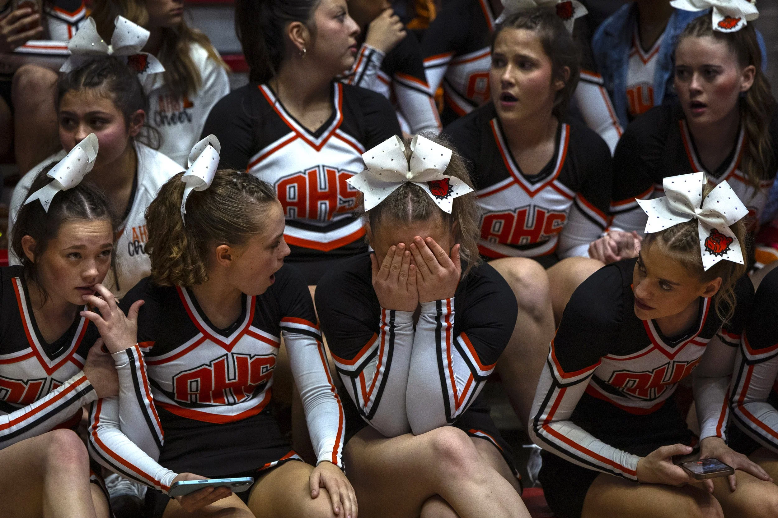   Artesia High School cheerleaders await the results of the NMAA Class 4A cheerleading awards in the Pit in Albuquerque, New Mexico on Saturday, March 21, 2026.  