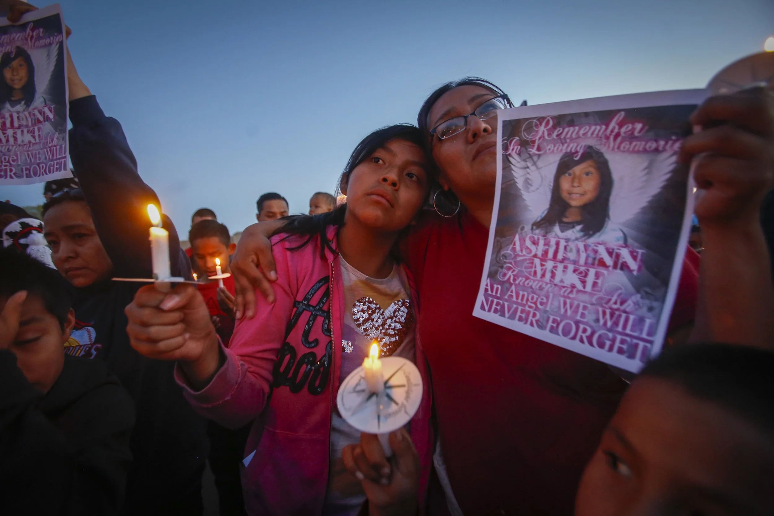  Community members hold a vigil for Ashlynne Mike at the San Juan Chapter house in Lower Fruitland on Tuesday, May 3, 2016. 