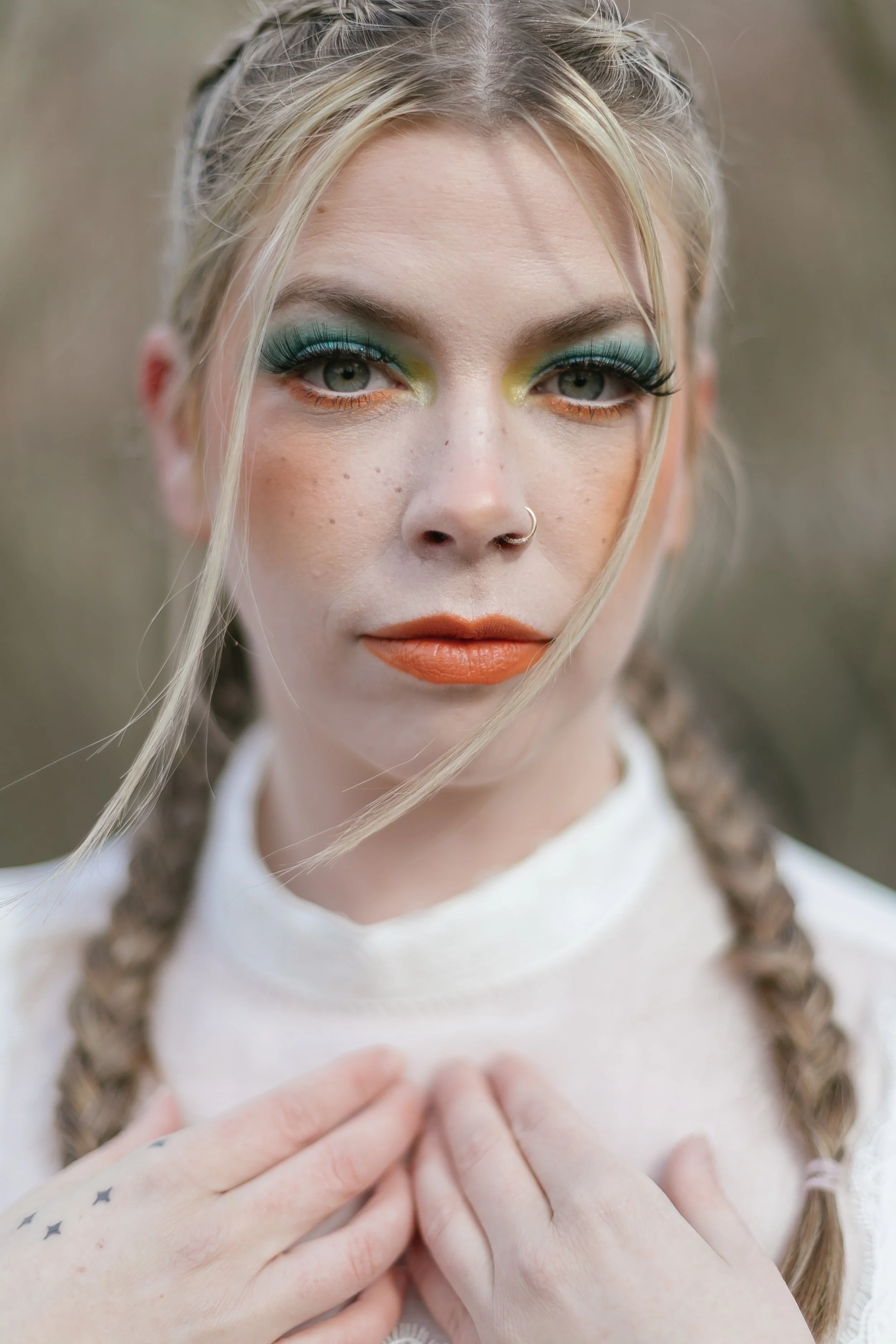 Woman with makeup on, neutral palette 
MUA: HKF Studio
Model: Kat