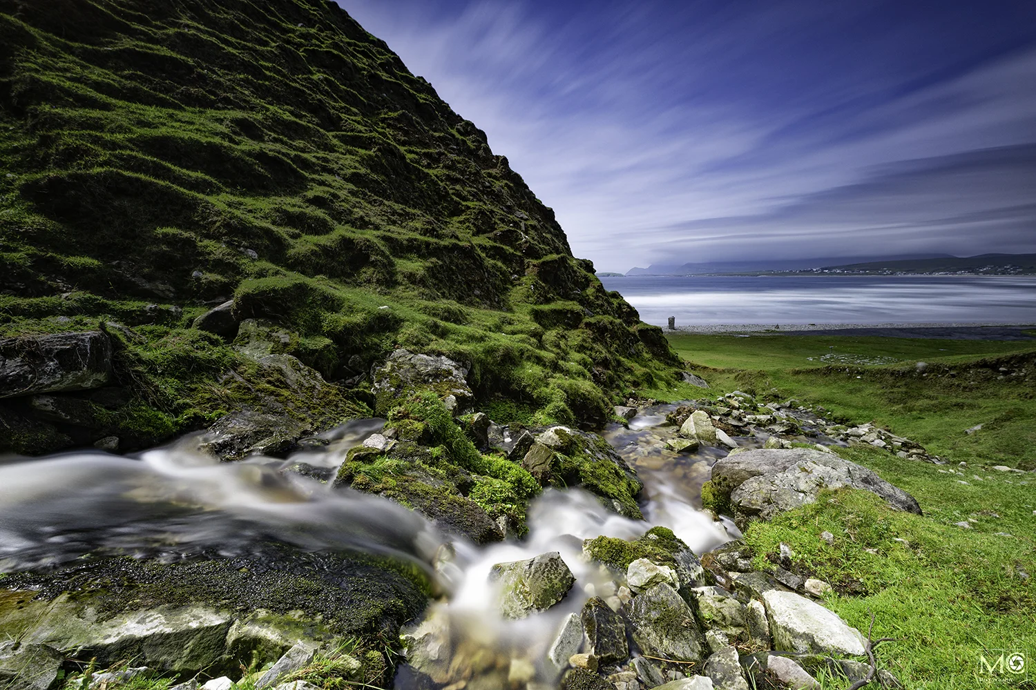 River flowing out to sea at Keel Strand, Achill Island, Co. Mayo, Ireland