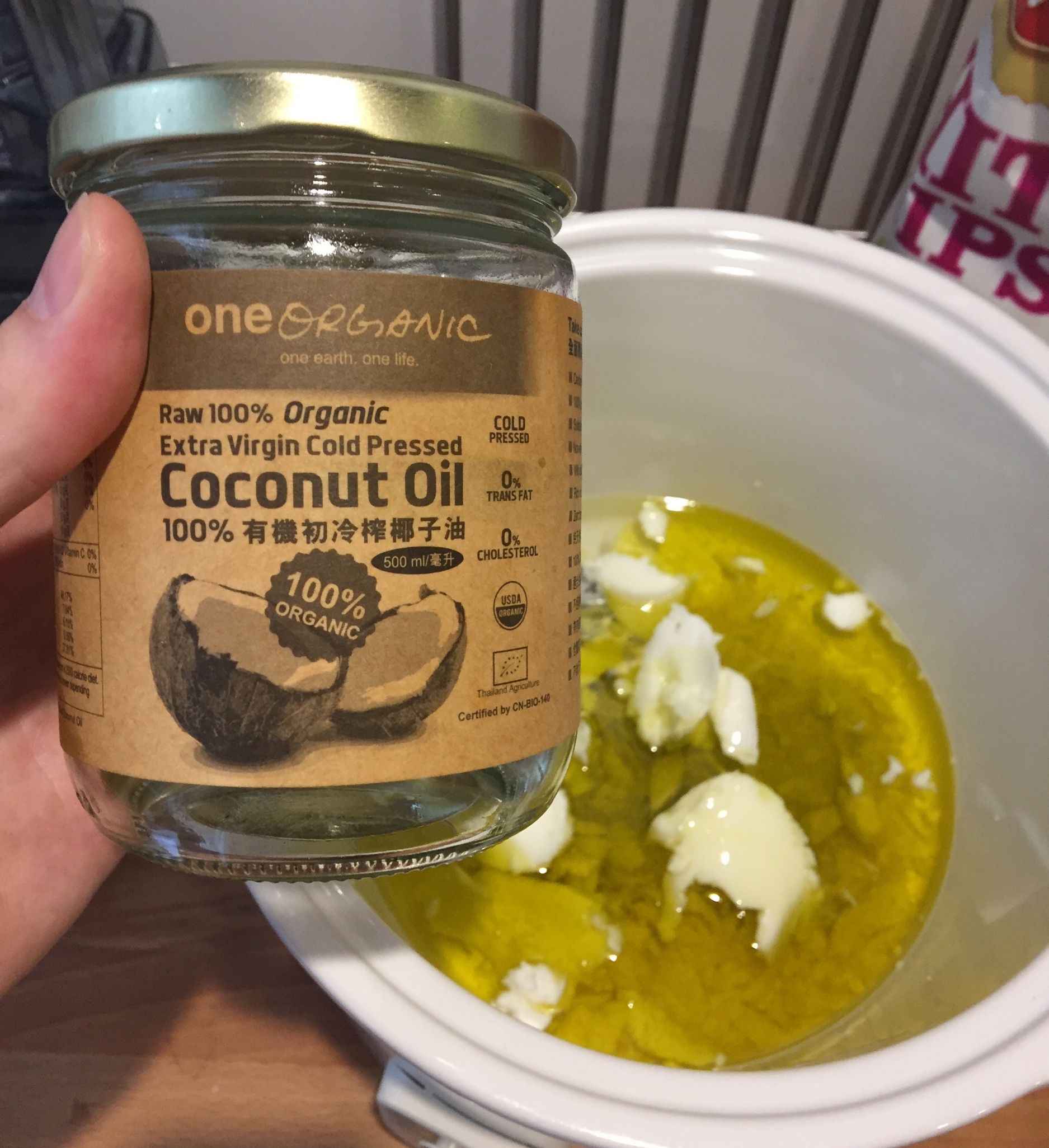 Next, add the olive oil (300 mL) and the coconut oil (300 mL) to the slow cooker and turn it on LOW. &nbsp;You can actually alter the ratio of olive oil-to-coconut oil depending on how you want the final color of the soap to turn out. &nbsp;Cover an…