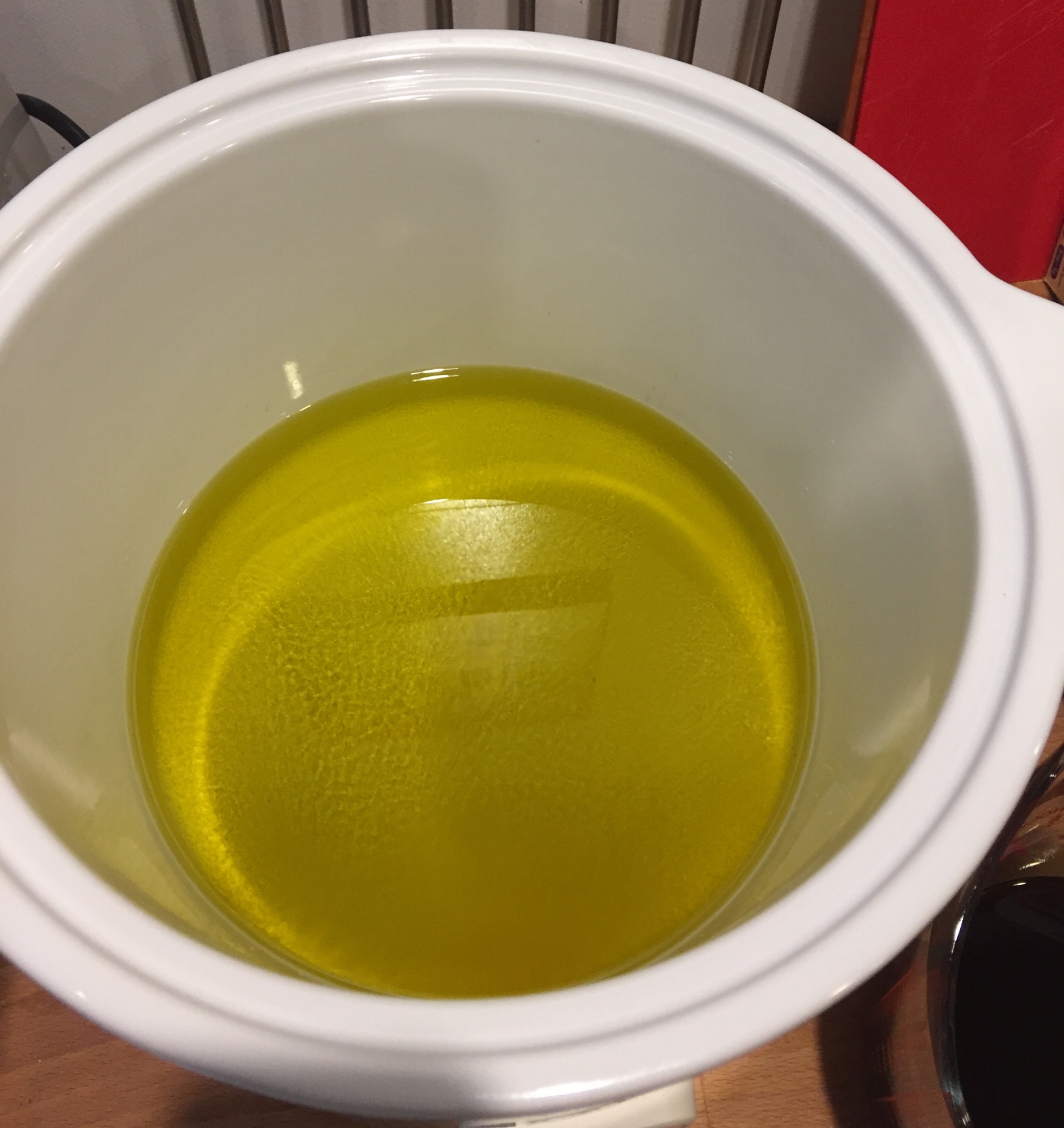 After 30-60 minutes hopefully the beer-lye mixture will cool down and your oils will be melted and combined. &nbsp;At this point you can add the beer-lye mixture to these oils in the slow cooker.
