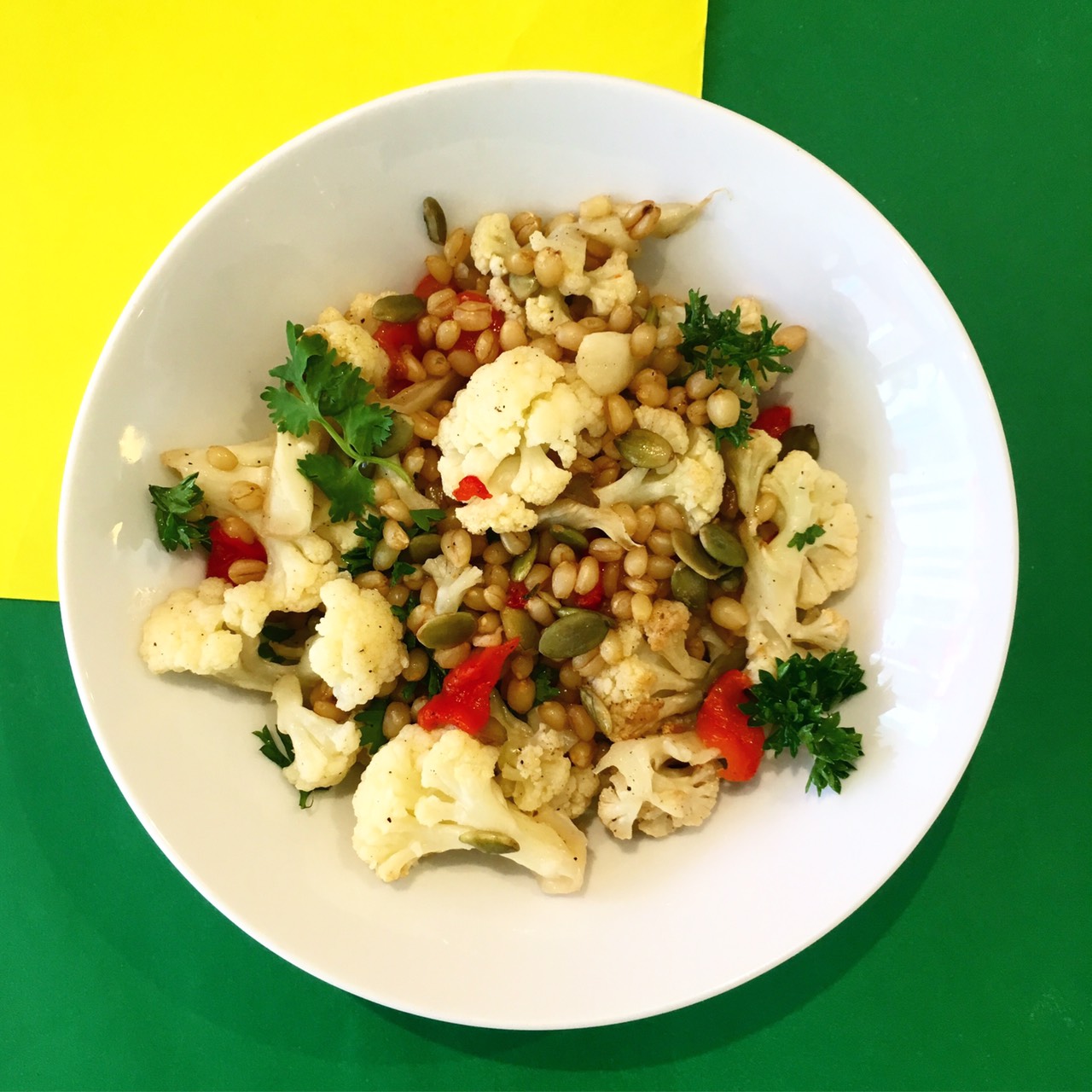 (dairy free, nut free, soy free) cauliflower, red pepper, wheat berry, coriander, parsley, pumpkin seeds, lime, honey, olive oil, salt & pepper