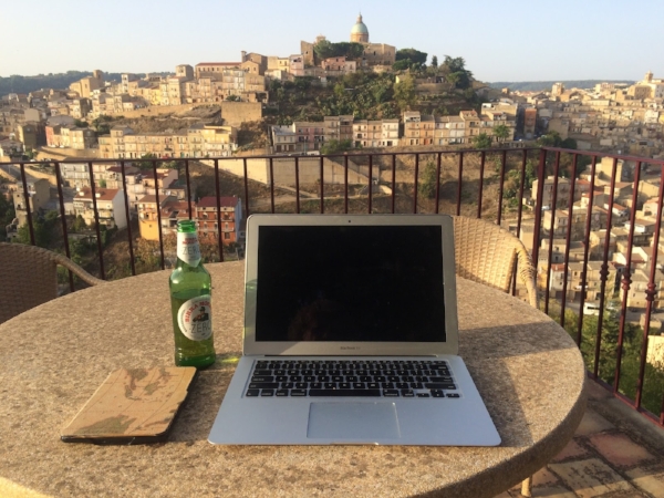 Getting a little work done at our B&B in Piazza Amerina.