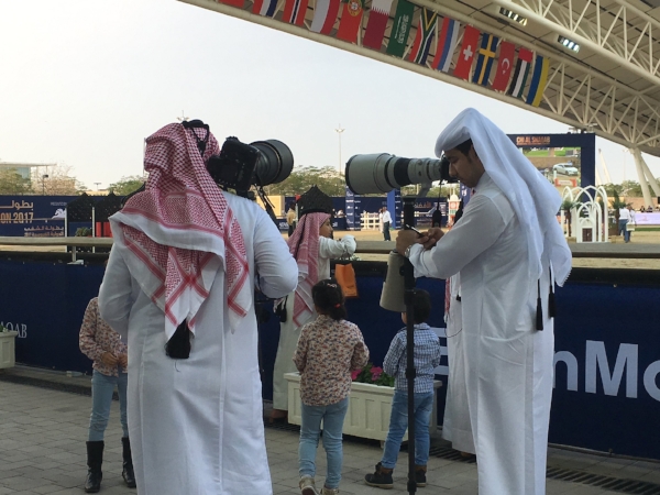 Just two proud dads taking happy snaps of their kids competing in the junior trials.