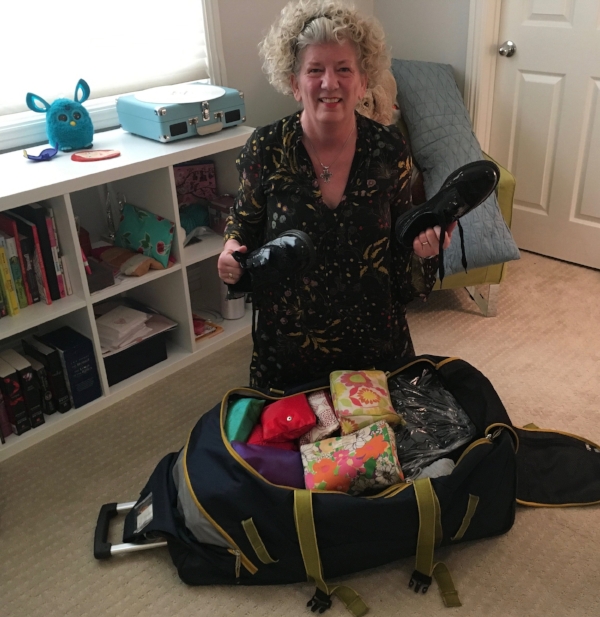 Me practice packing back in L.A. Now with the weight reprieve in Paris, the shoes can stay!