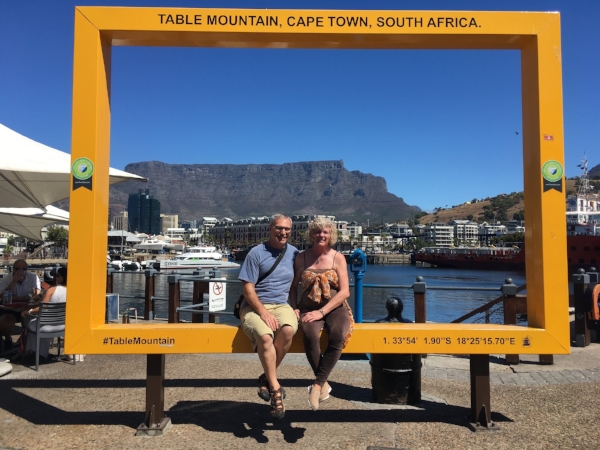 Enjoying the sun and the waterfront with Table Mountain framed behind us.