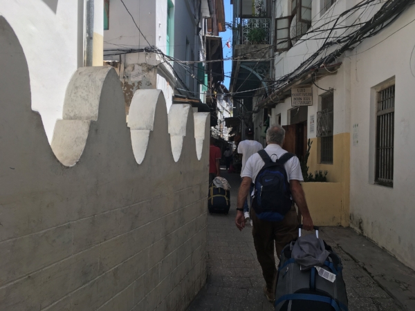 Once again hauling our trusty REI bags to the next destination whereever that might be!