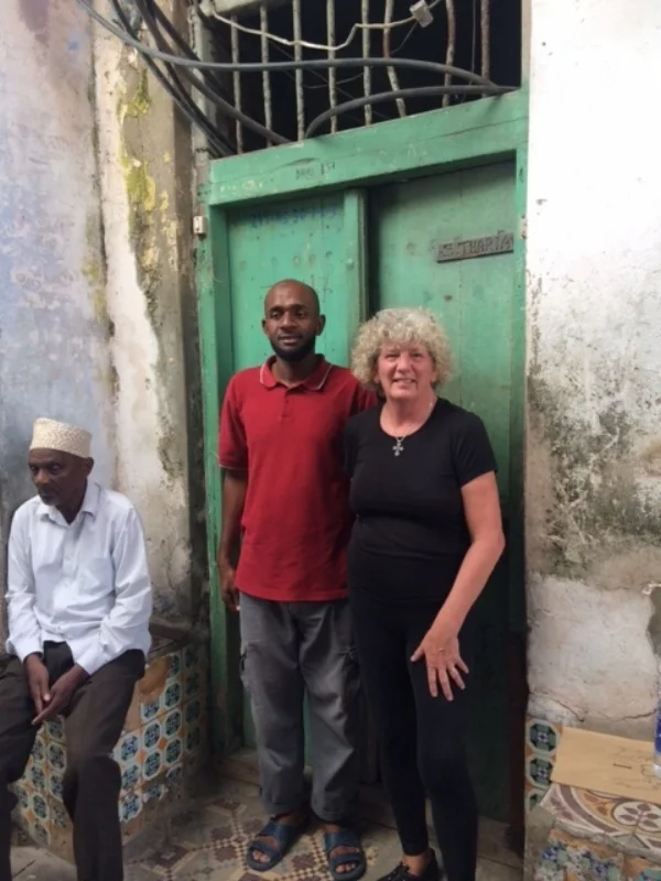 Salum got us safely to our less than inviting front door. It was typical for the street.