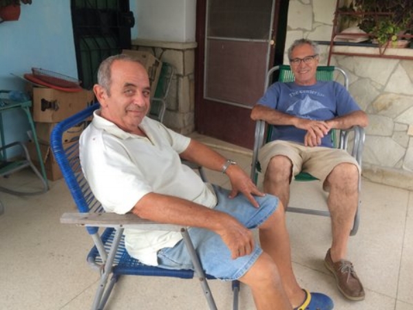 Michael talking politics with Evilio, one of our hosts in Cuba.