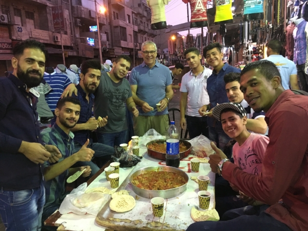 Joining the boys for an Iftar feast on the street in old town Amman.