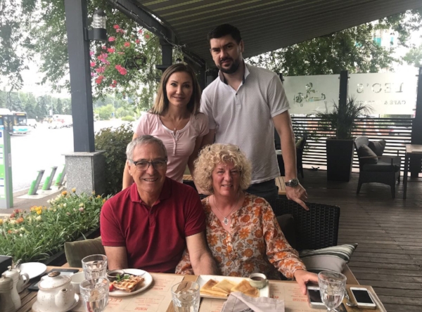 Having a delicious breakfast with our Almaty hosts Anastassiya and Paul.