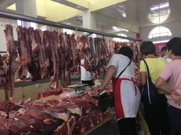 The "meat market" took on a whole new meaning in the Osh Bazaar. Debbie perused the wide selection of fresh "whatever-was-on-offer" but declined to buy.
