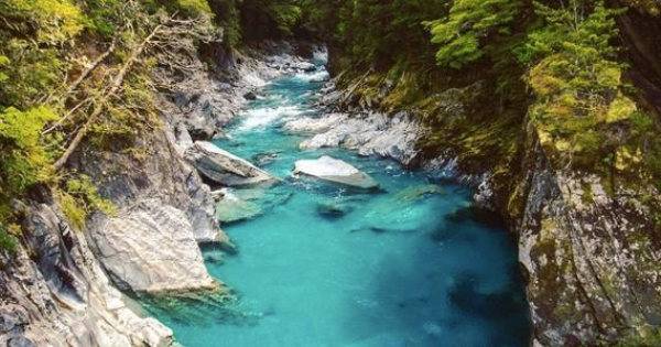 The icy Blue Pools. Further towards the river there were plenty of people willing to brave the water.