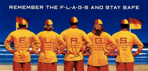 Aussie Lifesavers with a clever way to remind swimmers to pay attention to the flags!