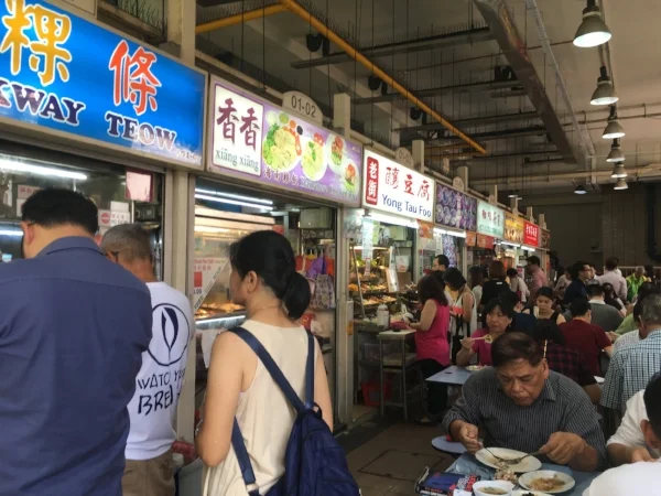Singapore's many Hawker Centers fuel this city with an array of cheap eats. One rule - if you see a tissue pack on the table, that seat is taken!