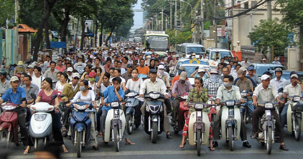Traffic in Saigon is insane - and crossing the street can be life-threatening. But we learned how to do it. You just start walking and don't slow down! The best advice we were given was "Commit or be hit!" In other words, own it. Don't dither or change pace and never turn back! The drivers will flow around you like water. It's true!