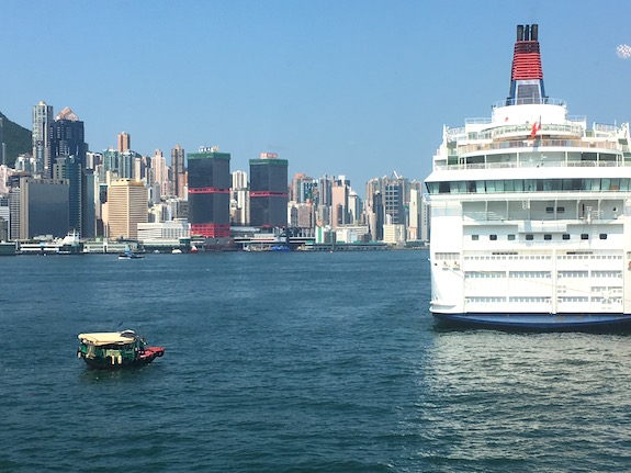 There is room in Hong Kong harbor for everyone - here's a local water taxi returning cruise ship passengers. 